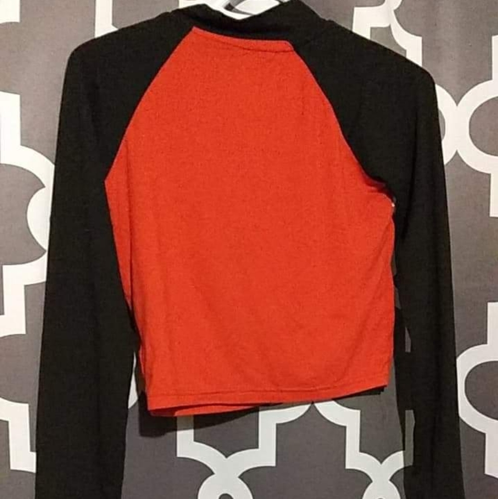 Black white and red zip-up shirt